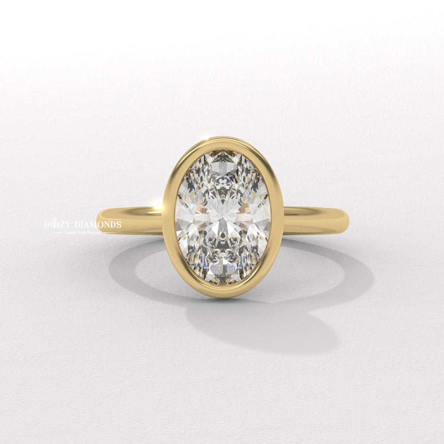bezel set diamond ring, oval bezel engagement ring, modern bezel ring,