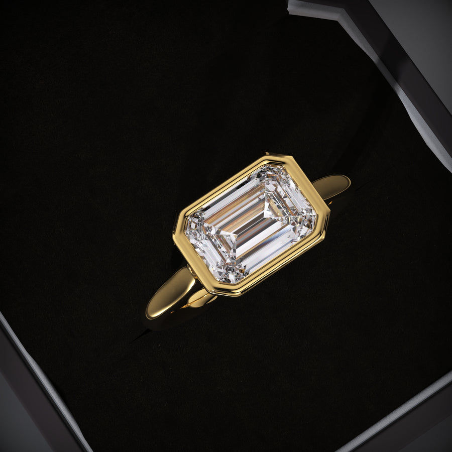 bezel set emerald ring
east west diamond ring
emerald lab grown diamond ring
lab grown engagement ring
emerald cut engagement ring
