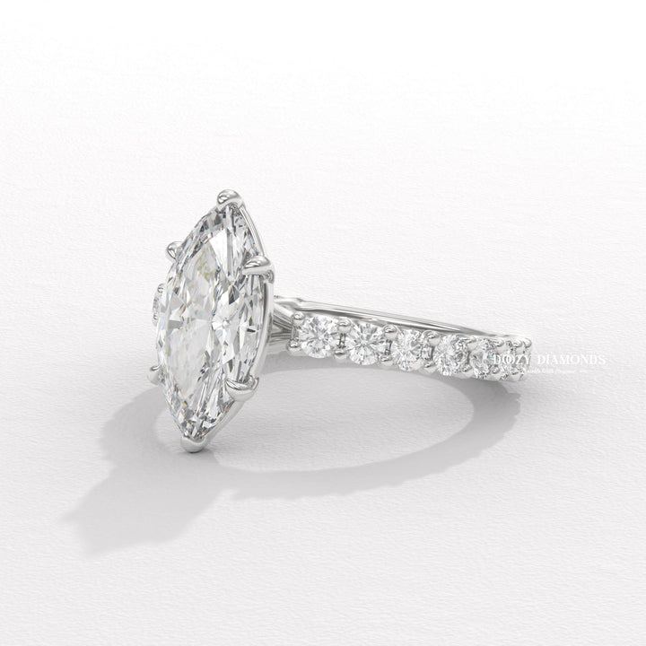 bridal fashion jewelry, artisan diamond ring, refined bridal jewelry, exclusive engagement ring, signature marquise ring, sparkling bridal jewelry, wedding celebration ring, commitment diamond ring
