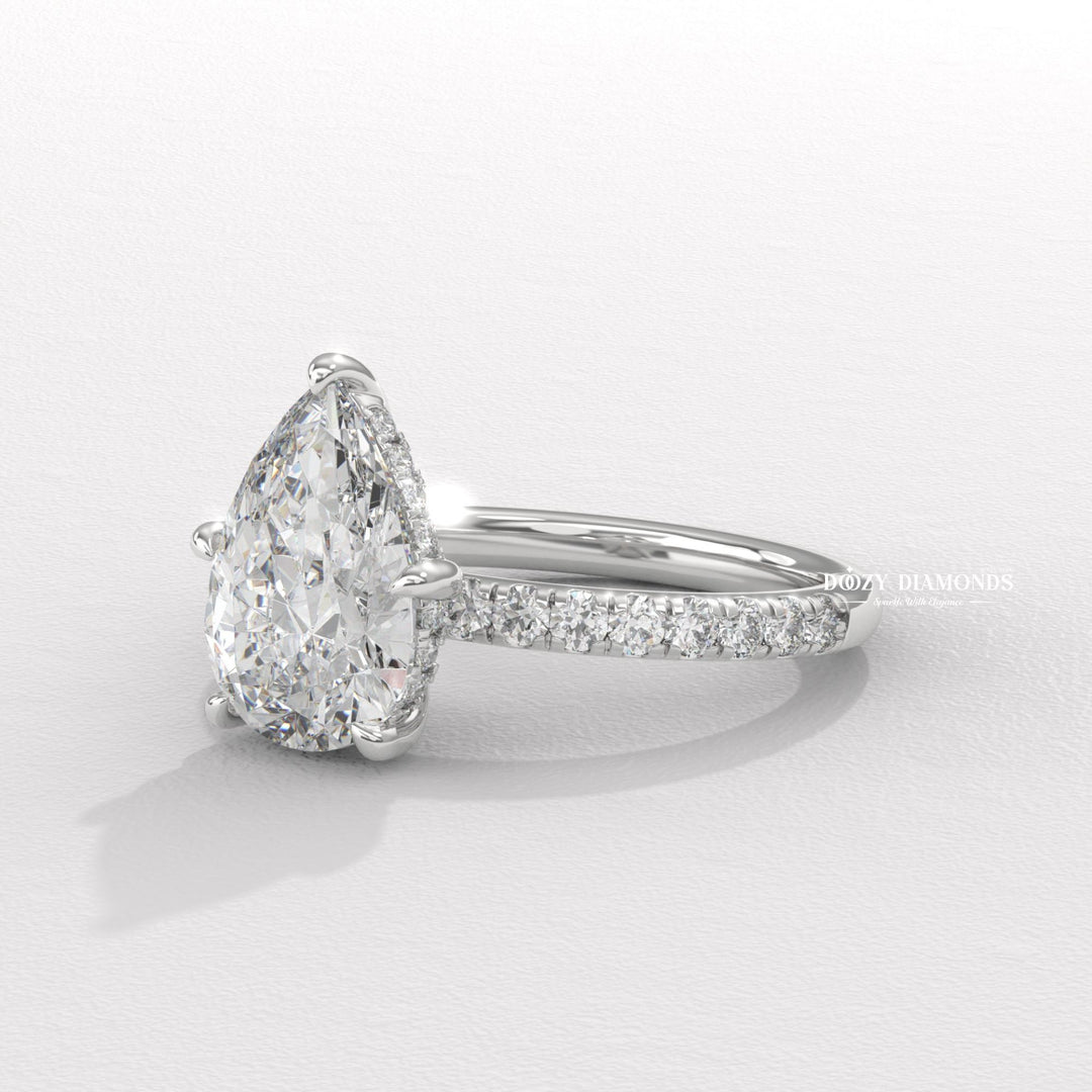 luxury engagement ring, sustainable diamond ring, ethical diamond ring, pear bridal ring, diamond ring for her, sparkling engagement ring, elegant engagement ring, timeless engagement ring, classic diamond ring, modern engagement ring, women's engagement ring,