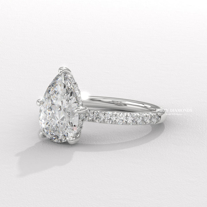 luxury engagement ring, sustainable diamond ring, ethical diamond ring, pear bridal ring, diamond ring for her, sparkling engagement ring, elegant engagement ring, timeless engagement ring, classic diamond ring, modern engagement ring, women's engagement ring,