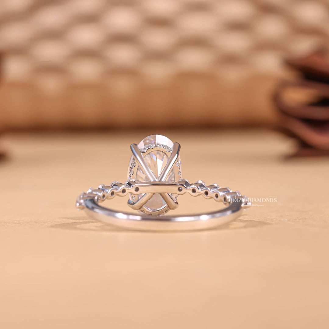 , luxury commitment ring, romantic diamond proposal ring, modern sustainable jewelry, premium engagement jewelry, luxury oval diamond ring, hidden halo proposal ring, oval diamond proposal ring