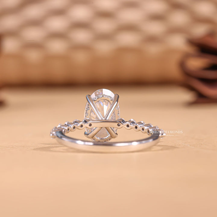 , luxury commitment ring, romantic diamond proposal ring, modern sustainable jewelry, premium engagement jewelry, luxury oval diamond ring, hidden halo proposal ring, oval diamond proposal ring