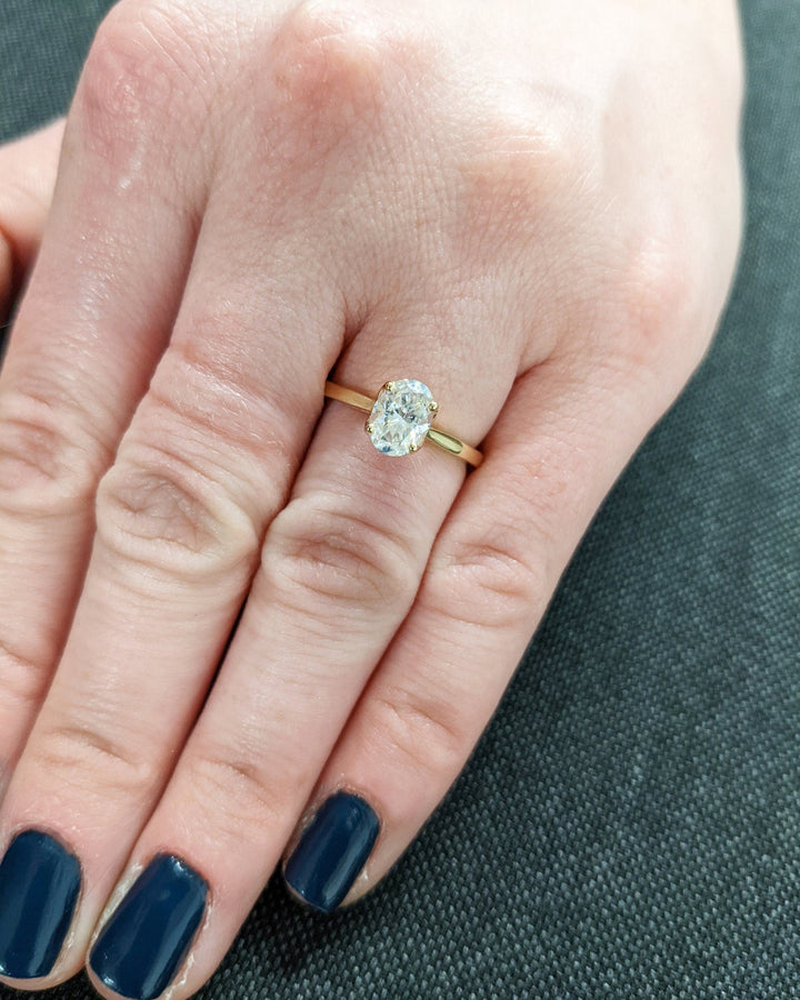 modern bridal ring with oval solitaire diamond
