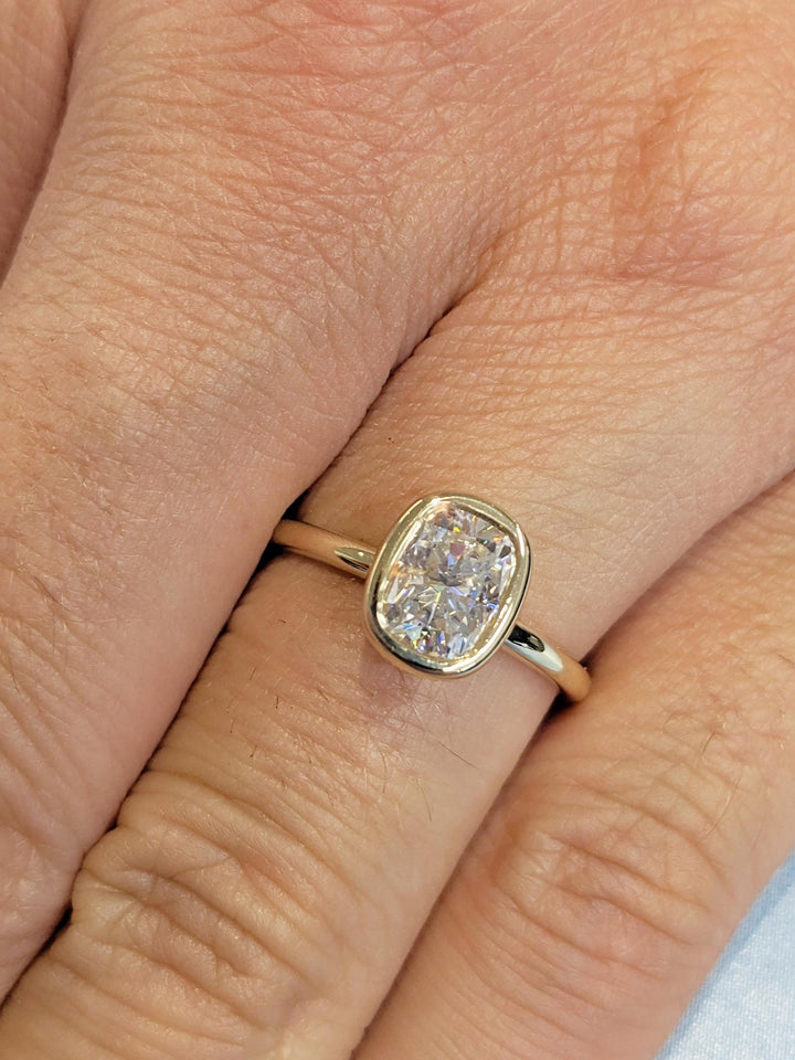 elongated cushion center diamond,