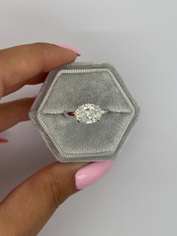 modern oval diamond ring,