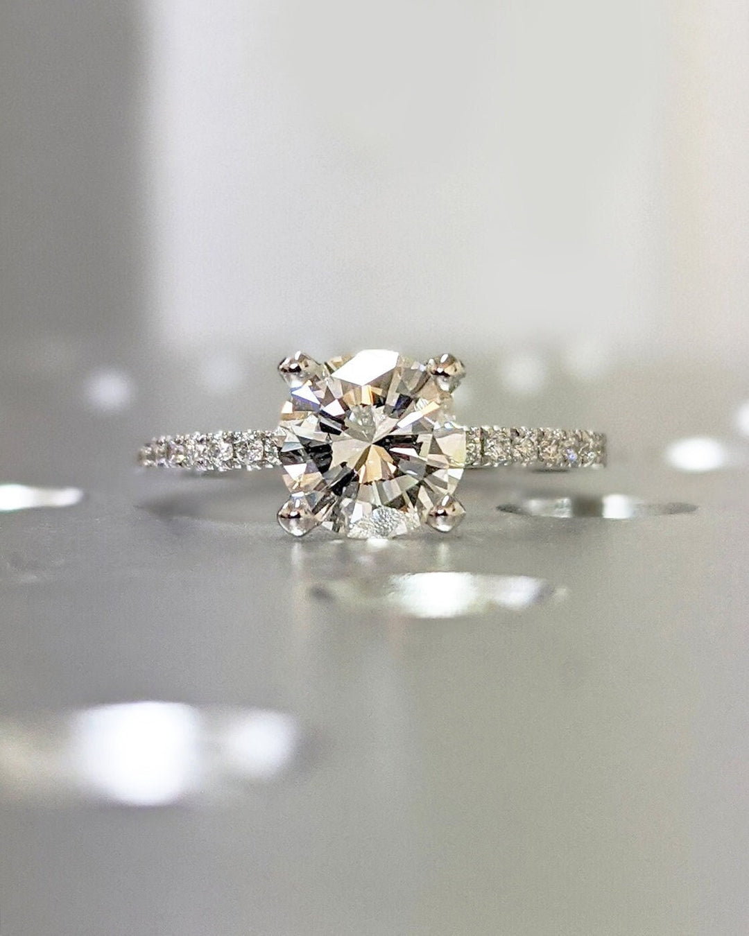 round diamond ring with pavé setting