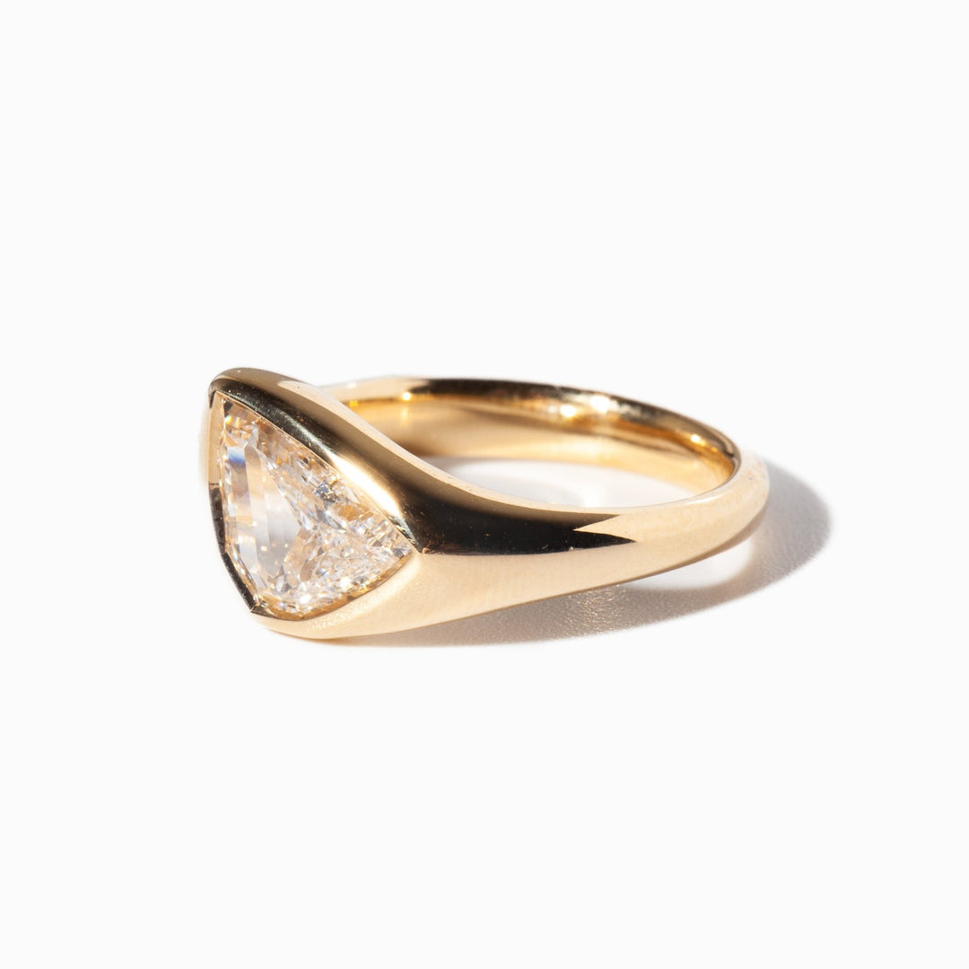 designer signet ring, statement engagement ring, sophisticated bridal ring, contemporary luxury ring, unique proposal ring, luxury love ring, fashion forward engagement ring.