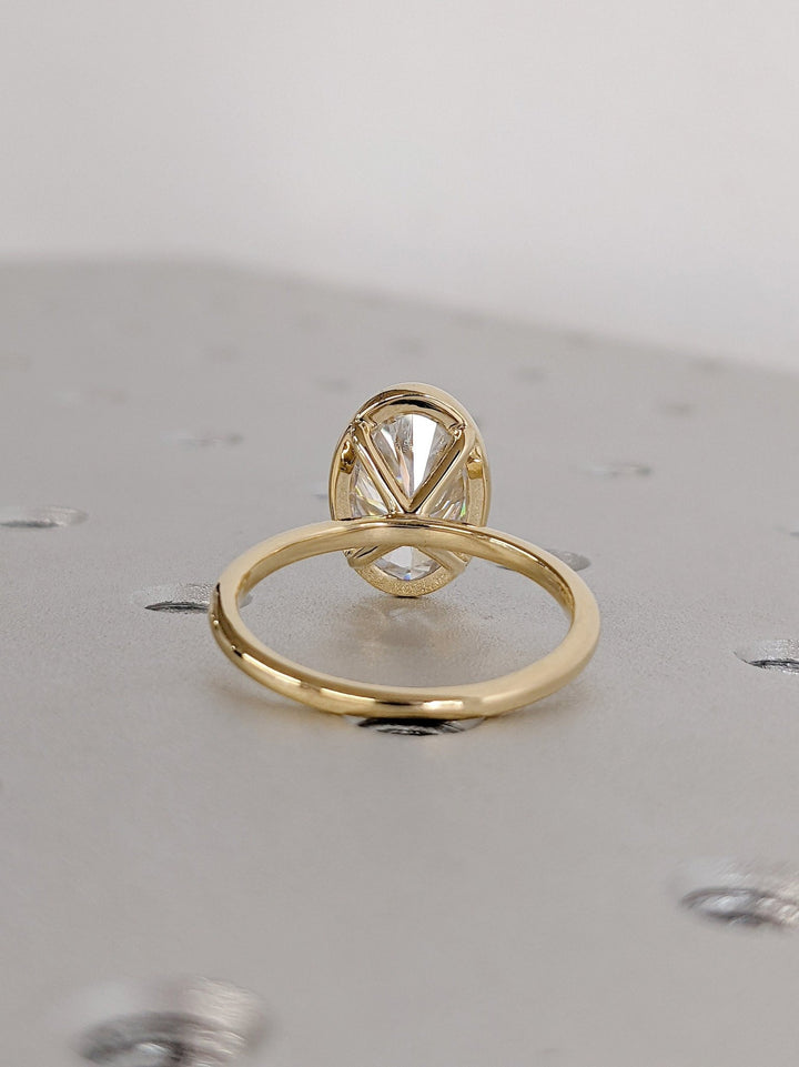 Lab grown diamond ring featuring oval center stone