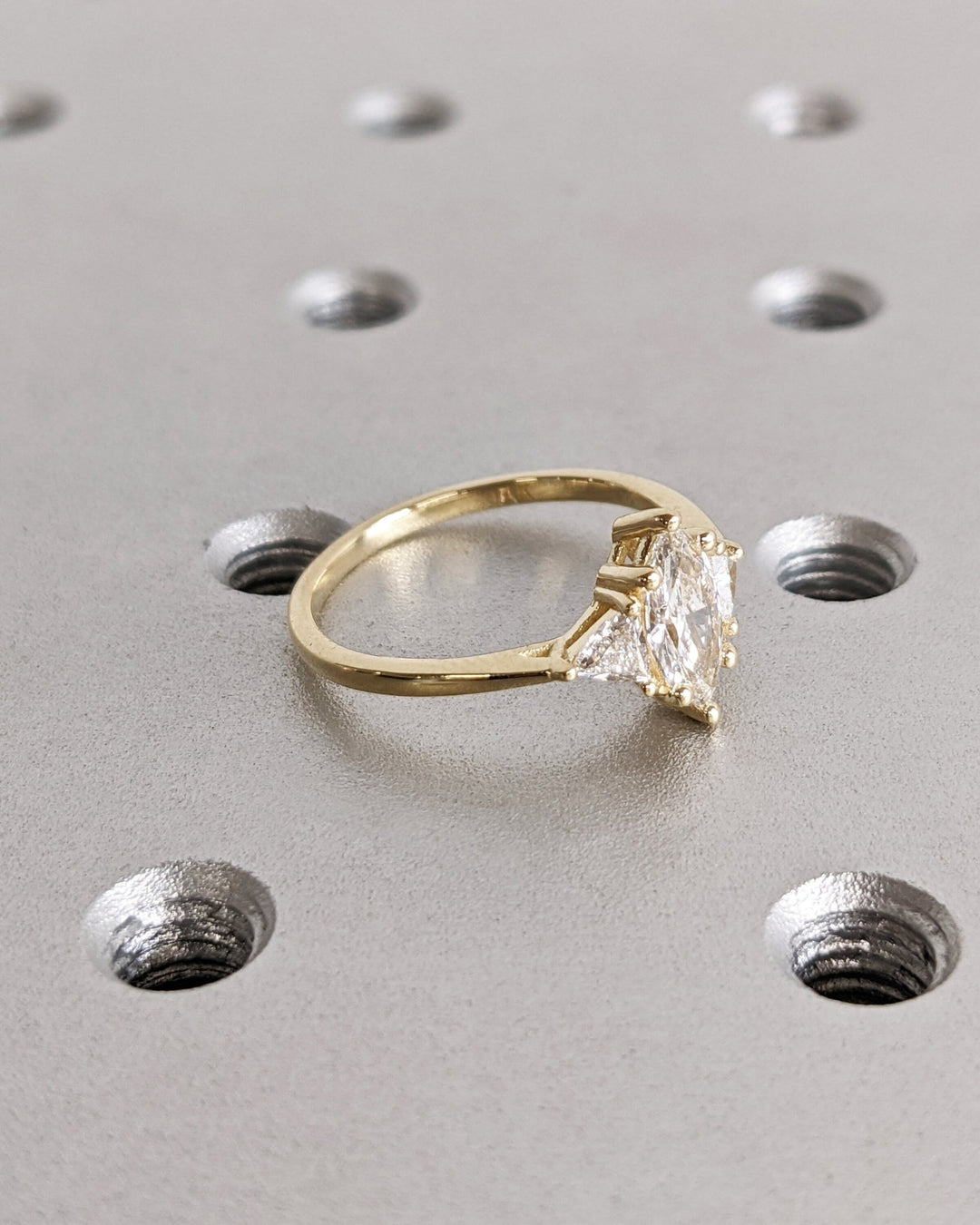 marquise cut center stone engagement ring,