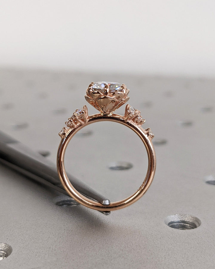 modern round engagement ring,