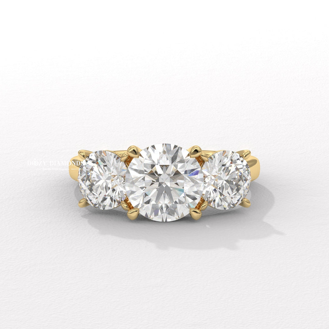 Round diamond with round side stones
Unique charm engagement ring
Three stone round diamond ring
Lab grown diamond three stone ring
