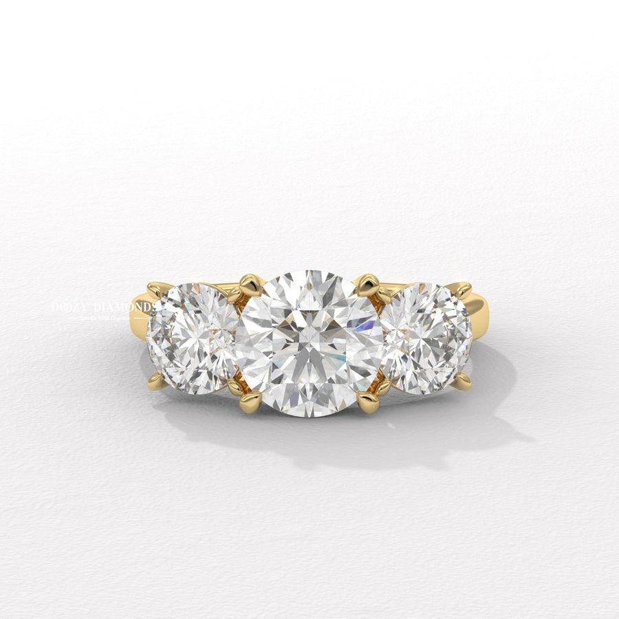 Round diamond with round side stones
Unique charm engagement ring
Three stone round diamond ring
Lab grown diamond three stone ring