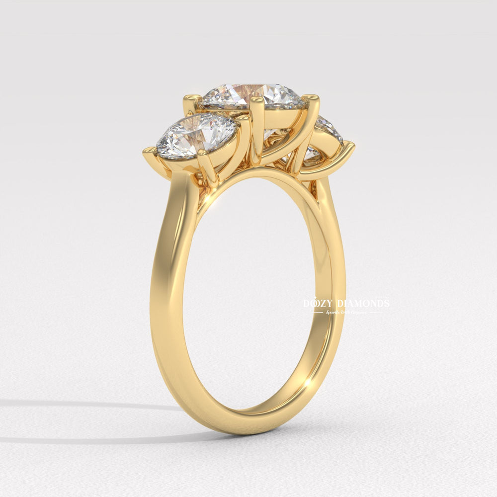 Round brilliant cut accent ring
Triple round diamond ring
Past Present Future ring
