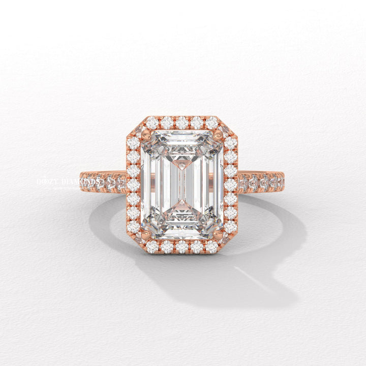 Emerald cut diamond
Emerald cut halo setting
Emerald cut pave setting
Emerald halo pave ring
Rectangular diamond ring
Step cut engagement ring