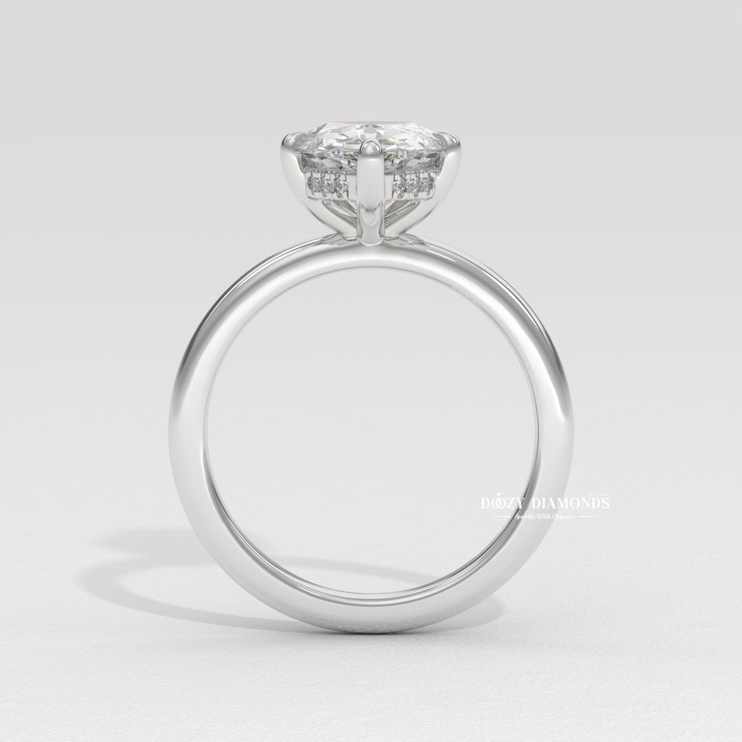 Unique pear shaped engagement ring
Platinum pear shaped solitaire ring
18k gold pear cut diamond ring
Timeless pear shaped engagement ring
Sparkling hidden halo diamond ring
