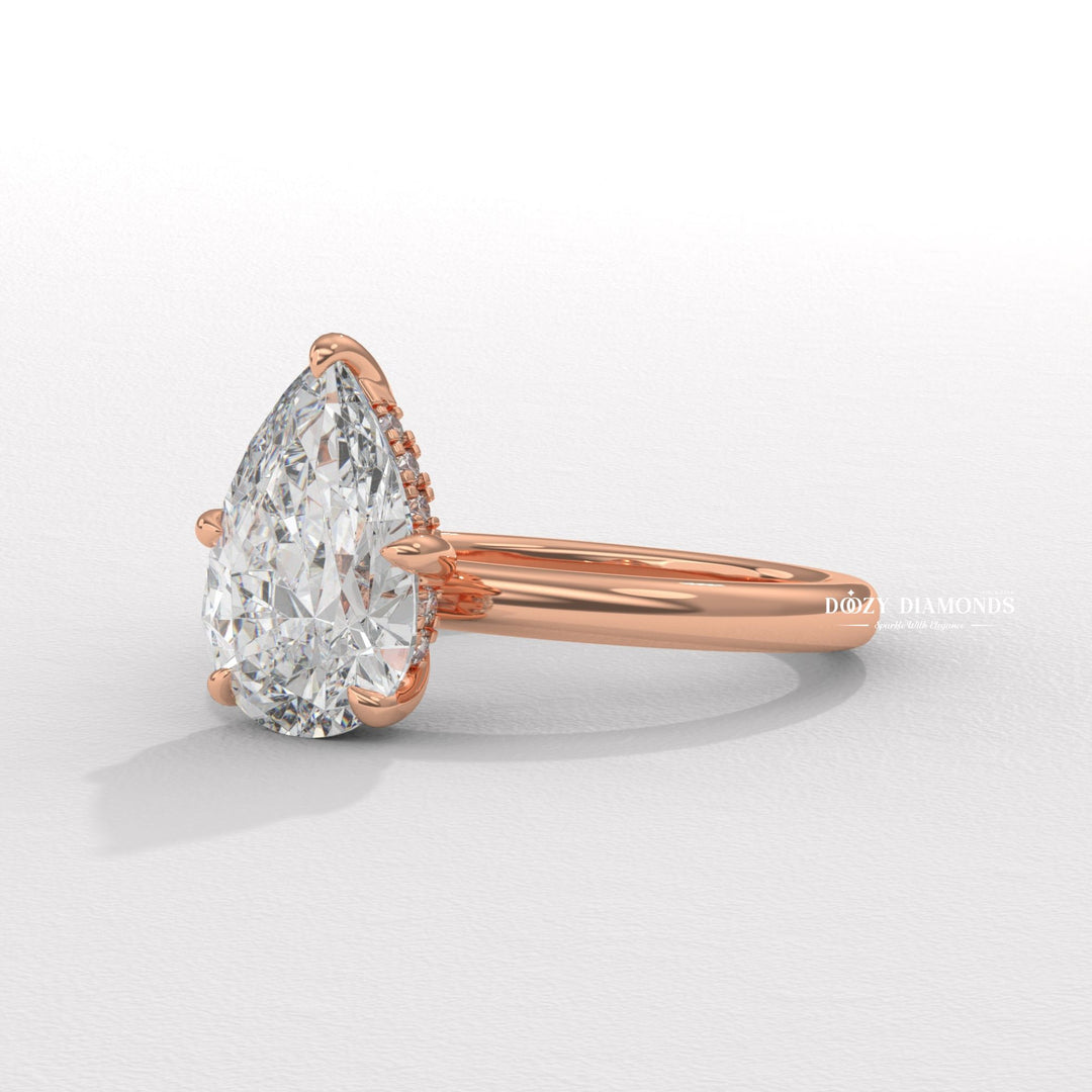 Hidden halo solitaire engagement ring
Pear shaped diamond ring with hidden halo
Teardrop diamond solitaire ring
Modern pear cut engagement ring
Low profile pear shaped engagement ring
Hidden halo pear diamond ring
Solitaire pear cut diamond rin