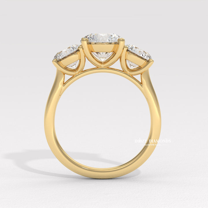 Round brilliant cut accent ring
Triple round diamond ring
Past Present Future ring
Round diamond side stone setting