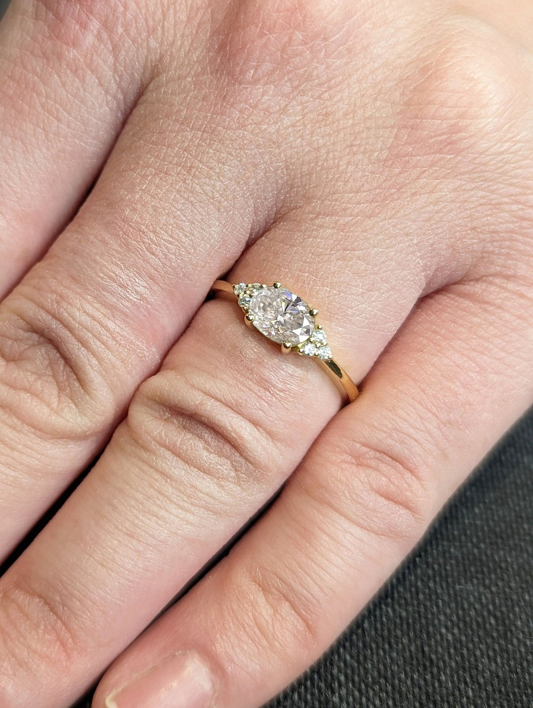 designer oval cluster diamond engagement ring