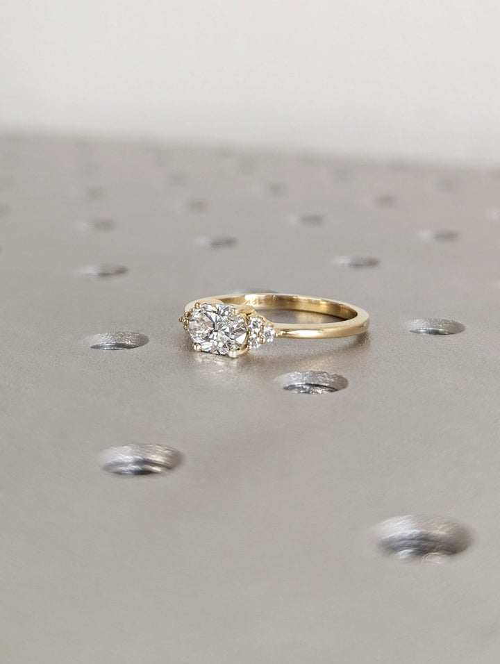 handcrafted oval cluster diamond ring,