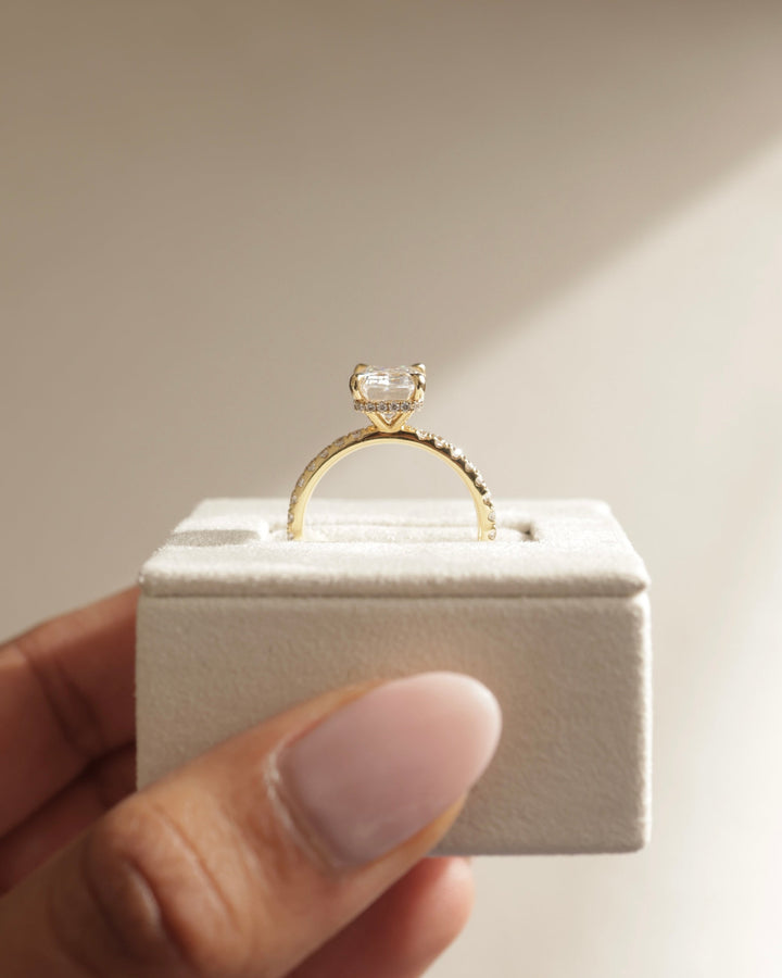 secure halo setting, refined halo setting, elegant halo setting, modern halo setting, classic halo setting, luxury halo setting, minimalist halo setting, structured halo setting, symmetrical halo setting, balanced halo setting, floating halo setting, split shank pavé setting, curved pavé setting