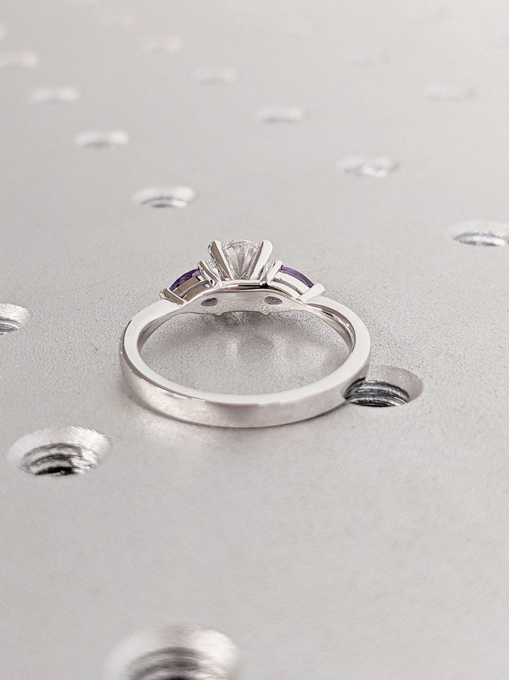 emerald cut cluster diamond proposal ring
