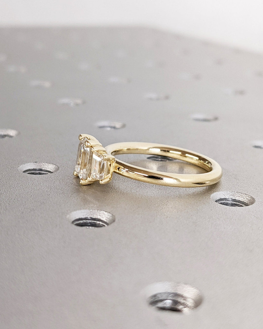 emerald cut proposal ring for her,