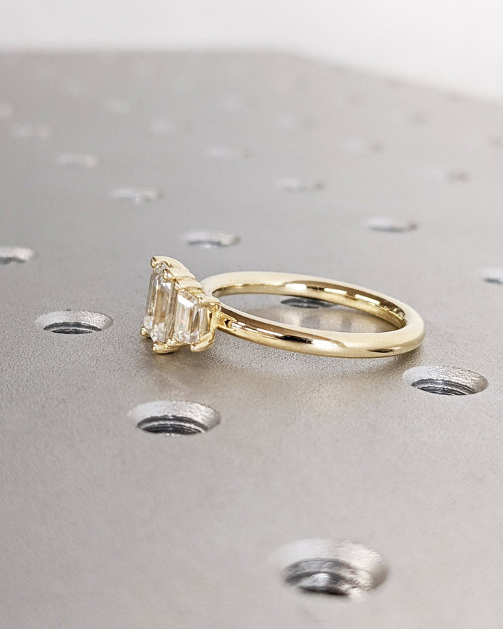 emerald cut proposal ring for her,