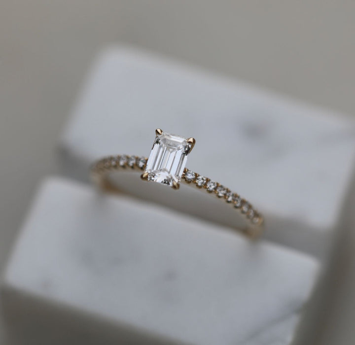 emerald solitaire engagement ring