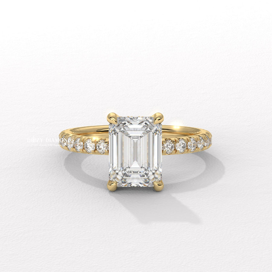 hidden halo engagement ring, emerald diamond ring, emerald cut diamond ring, emerald shape diamond ring, yellow gold engagement ring, yellow gold diamond ring, emerald cut yellow gold ring,