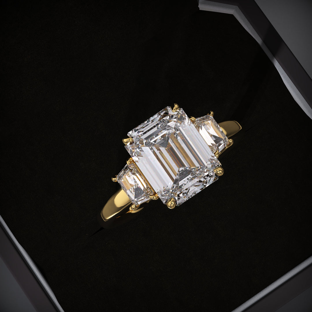 emerald lab grown diamond ring
three stone engagement ring
emerald cut engagement ring
lab grown diamond engagement ring
three stone diamond ring