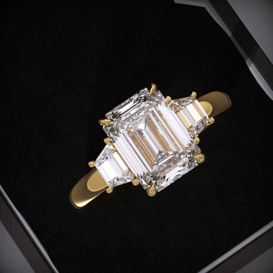 emerald lab grown diamond ring
three stone engagement ring
EVS1 diamond engagement ring
emerald cut engagement ring
lab grown diamond engagement ring