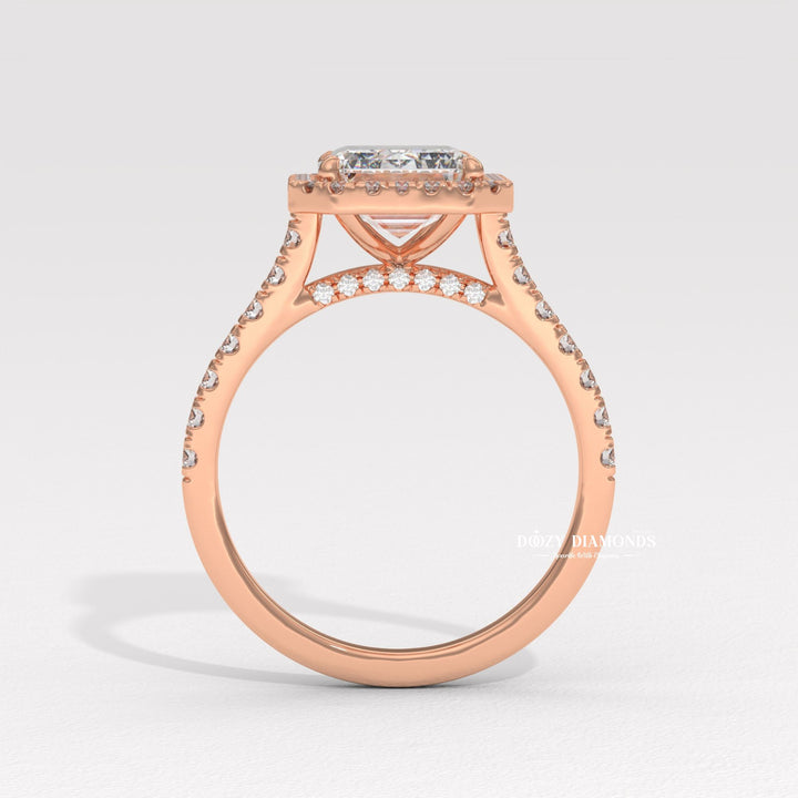 Vintage style emerald ring
Art Deco engagement ring
Classic engagement ring
Diamond halo setting