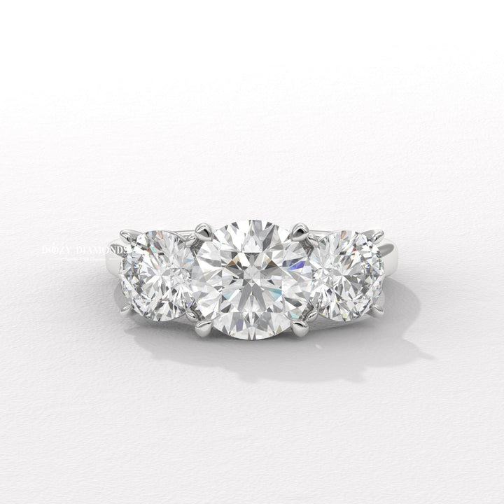 White gold side stone ring
Platinum round diamond engagement ring
Minimalist round three stone ring