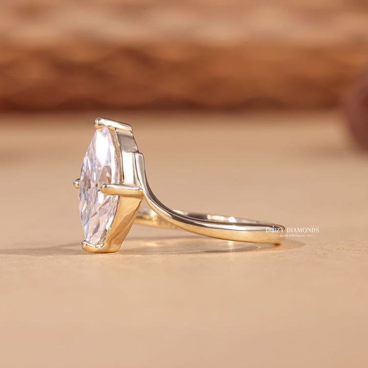 fine jewelry engagement ring, elegant diamond ring women, timeless diamond ring, women diamond jewelry, luxury bridal jewelry, sophisticated engagement ring, statement engagement ring, elongated diamond ring