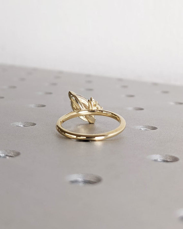 marquise cut side stone ring,
