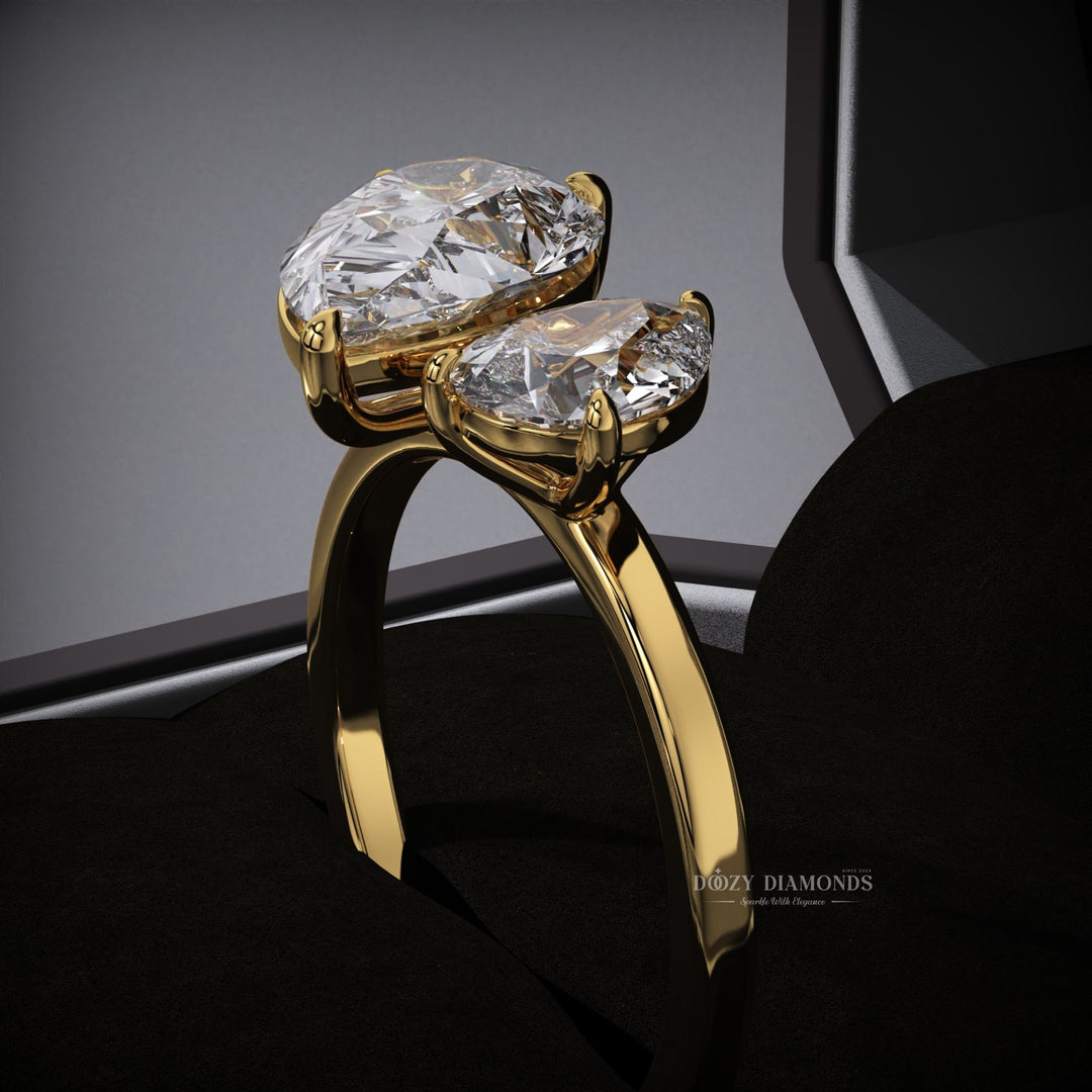 solitaire engagement ring
pear cut engagement ring
lab grown diamond engagement ring
pear solitaire ring
two stone engagement ring
sustainable engagement ring
eco friendly diamond ring
