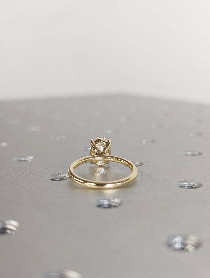 oval solitaire diamond setting,