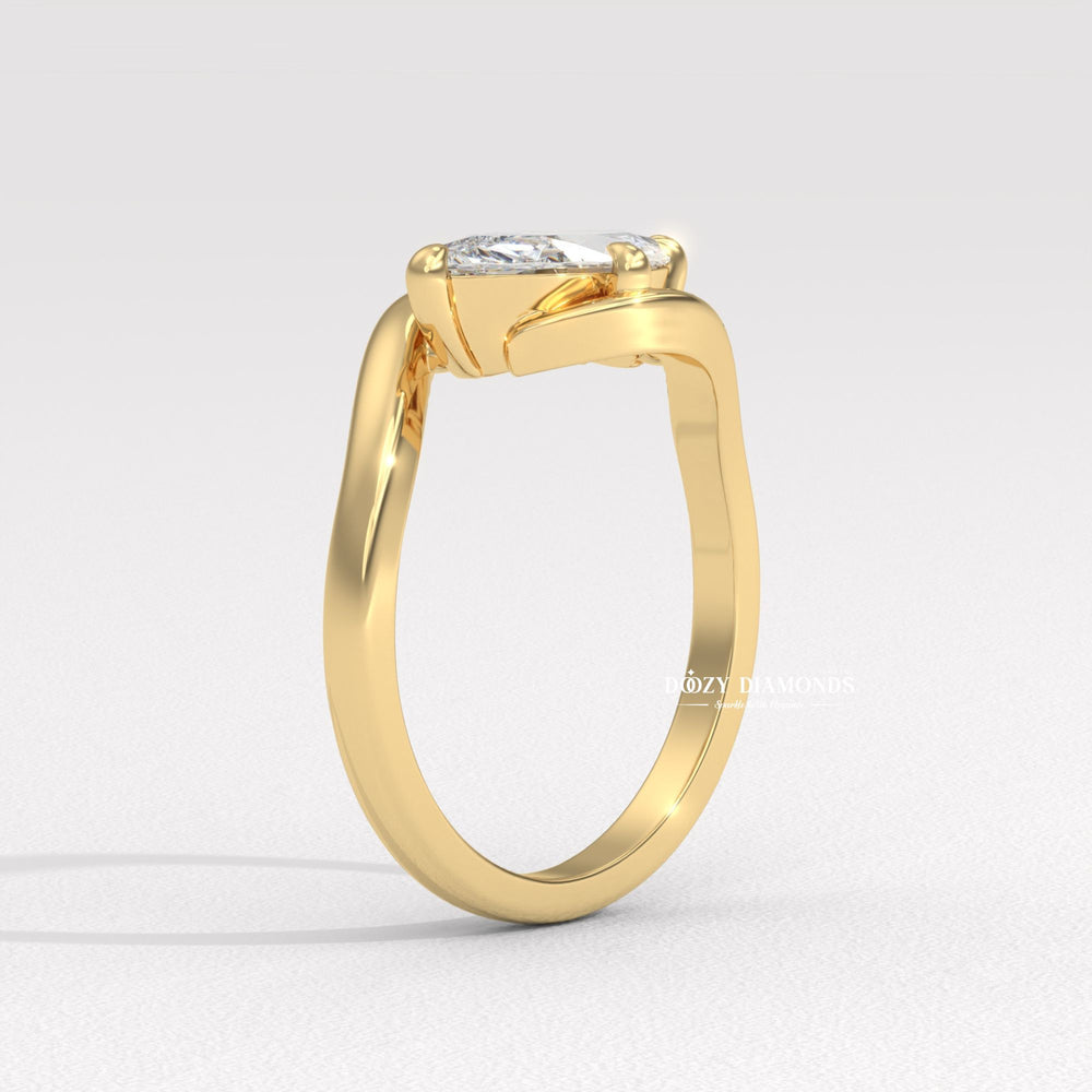 10. Minimalist Marquise East West Ring
11. Sculptural Bypass Engagement Ring
12. Open Cuff Bypass Ring