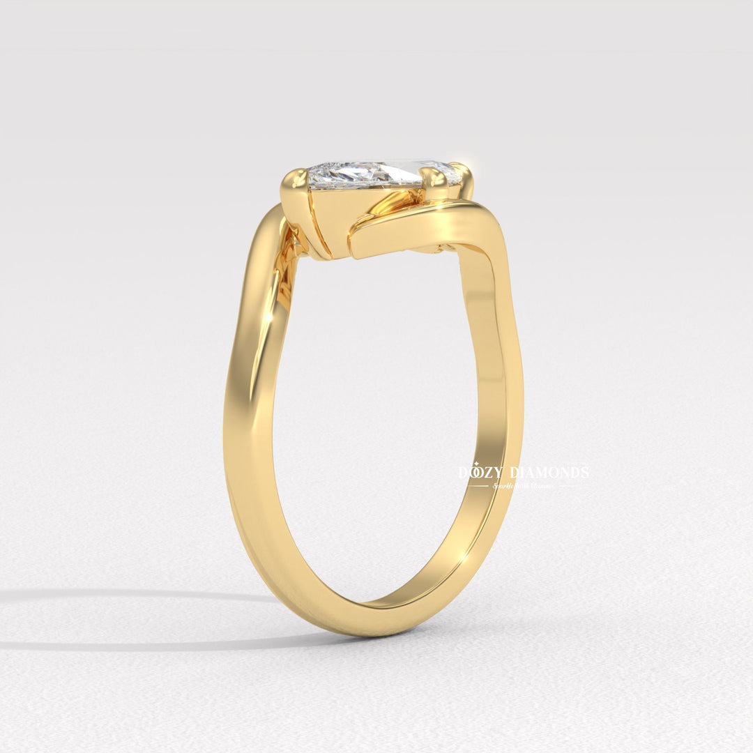 10. Minimalist Marquise East West Ring
11. Sculptural Bypass Engagement Ring
12. Open Cuff Bypass Ring