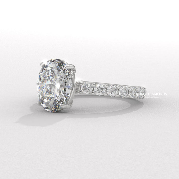 ethical bridal ring, diamond promise ring, engagement ring for bride, luxury engagement accessory, brilliant diamond ring, classic bridal jewelry, romantic jewelry gift, oval cut bridal ring