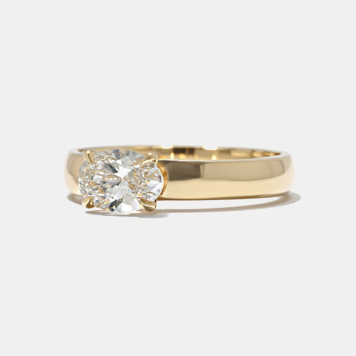exclusive diamond ring, fine luxury jewelry, sustainable bridal jewelry, handcrafted proposal ring, luxury engagement jewelry, modern luxury ring, elegant bridal ring, designer oval ring, oval statement ring