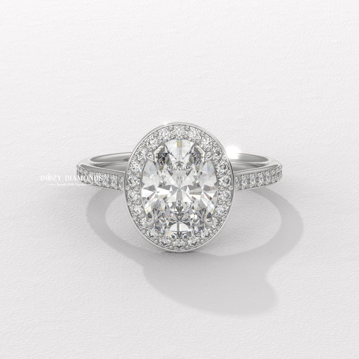 romantic engagement ring, statement engagement ring, designer engagement ring, halo bridal ring, luxury proposal ring, fine diamond jewelry, oval halo bridal ring, modern engagement ring, engagement gift for her, bridal ring set, oval halo diamond ring, elegant bridal jewelry,
