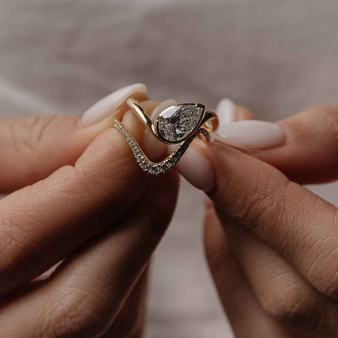 teardrop engagement ring, luxury pear ring, pear proposal ring, pear solitaire engagement ring, pear cut engagement ring, pear center stone ring, unique pear ring, elegant pear ring, designer pear ring, premium pear diamond ring, romantic engagement ring, bridal jewelry, wedding jewelry,