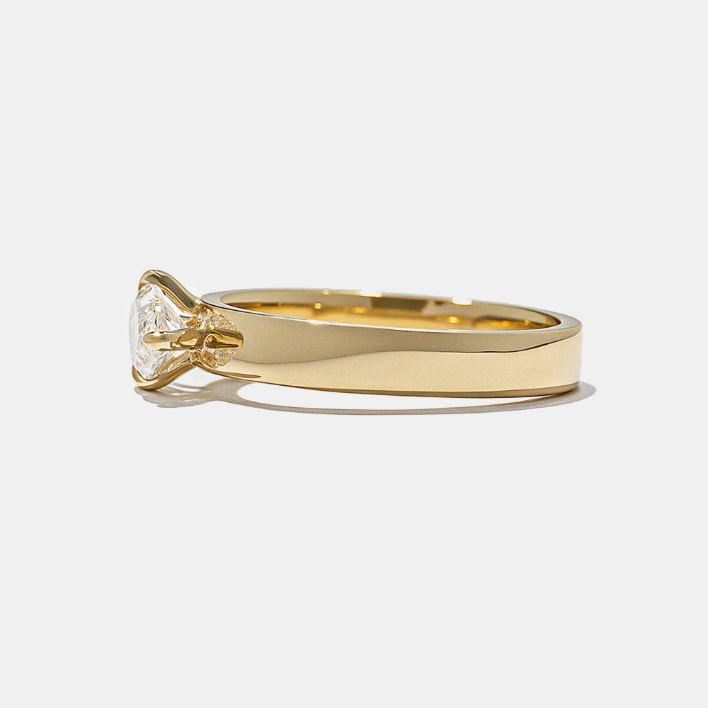 timeless bridal ring, luxury heirloom ring, exclusive diamond ring, fine luxury jewelry, sustainable bridal jewelry, handcrafted proposal ring, luxury engagement jewelry, modern luxury ring, elegant bridal ring, designer marquise ring, marquise statement ring, sophisticated bridal ring,