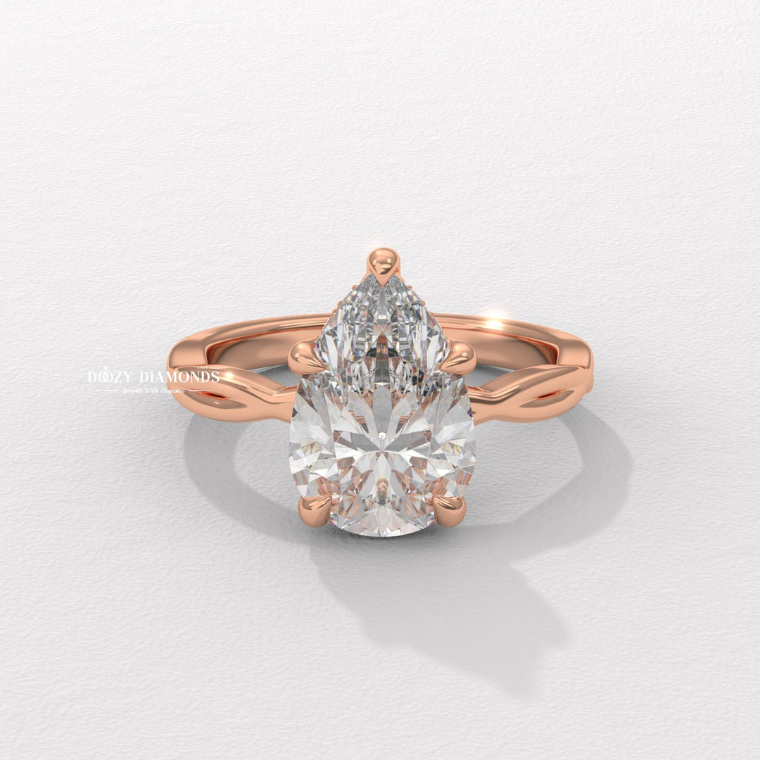 pear pave ring, pear cathedral ring, pear solitaire engagement ring, pear bezel ring, pear prong set ring, V prong pear ring, five prong pear ring, basket setting ring, tulip setting ring, gallery rail ring