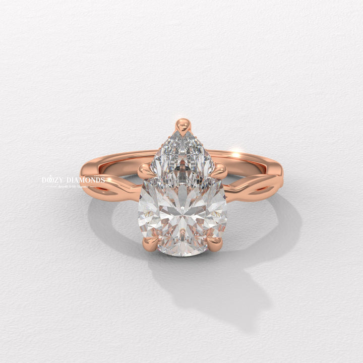 pear pave ring, pear cathedral ring, pear solitaire engagement ring, pear bezel ring, pear prong set ring, V prong pear ring, five prong pear ring, basket setting ring, tulip setting ring, gallery rail ring