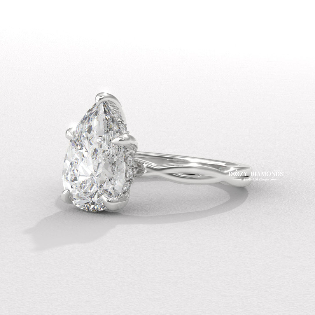 tulip setting ring, gallery rail ring, yellow gold bridal ring, raised setting engagement ring, high profile engagement ring, luxury pear ring, vintage engagement ring, vintage style ring, modern solitaire ring, classic solitaire ring, pear diamond solitaire, solitaire engagement ring, micro pave diamond ring, french pave diamond ring, shared prong pave ring, split shank engagement ring