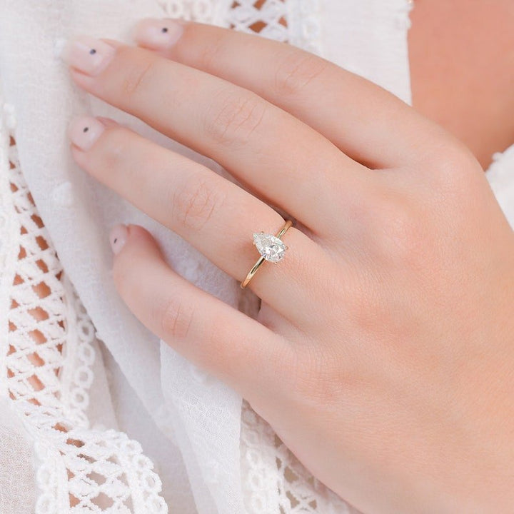 pear center stone ring