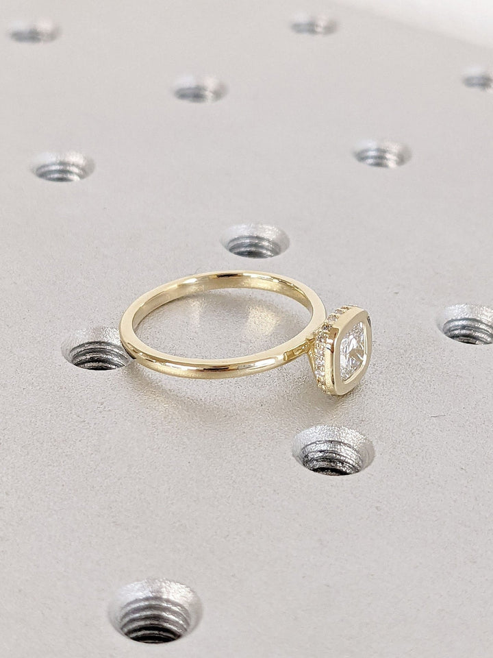 cushion cut bezel set ring,